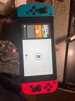 Nintendo Switch 32GB Red/Blue Bundle + Mario Kart 8