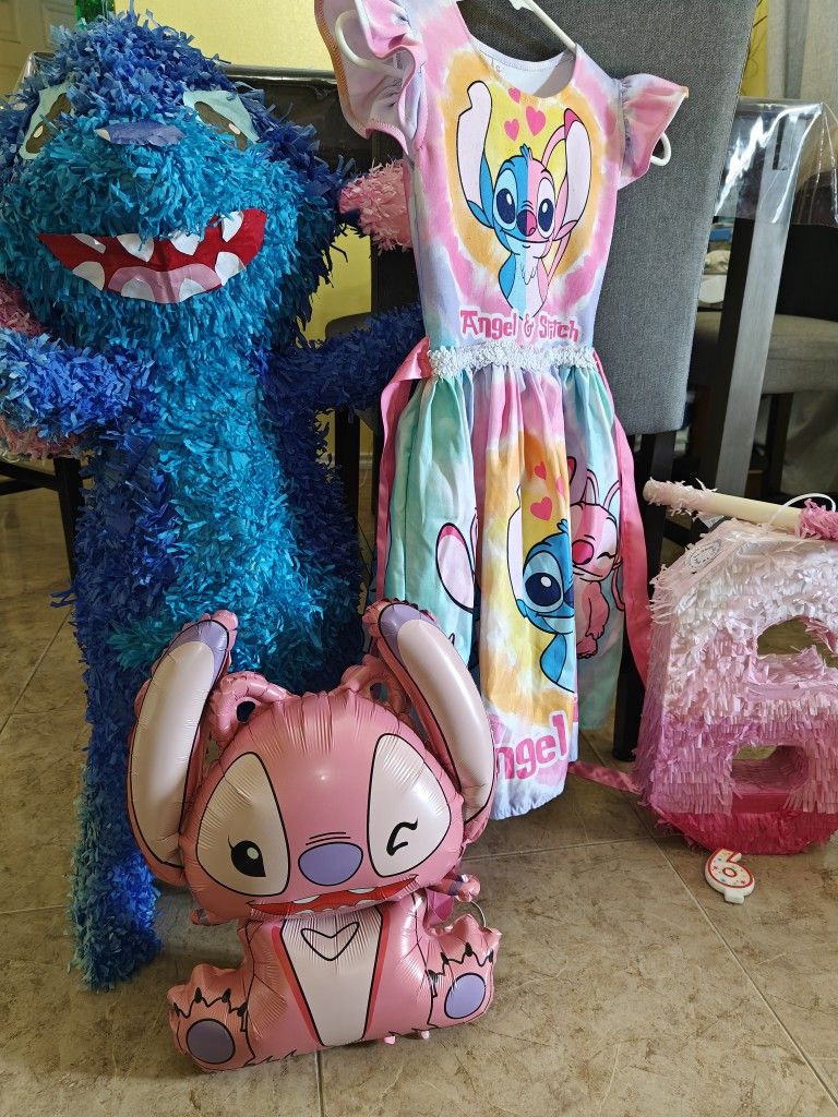 1 Dress Size 6, 2 Piñatas, 1 Candle, 1 Angel Balloon.