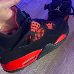 Red Thunder Jordan 4s 