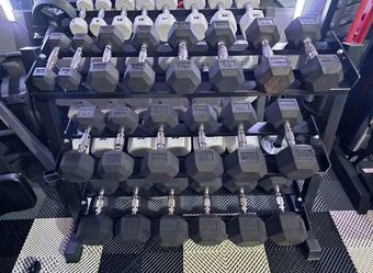 Rogue Hex Rubber Dumbbells 5-50 LB with REP 3-Tier Dumbbell Rack