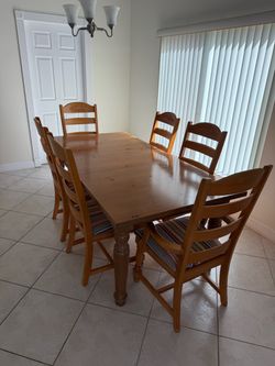 Broyhill Wood Dining Table with 6 Chairs and Credenza