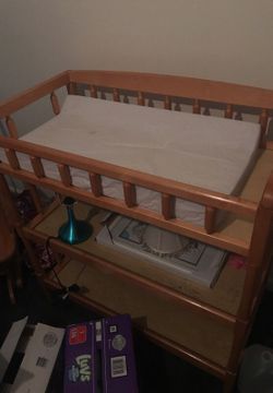 Changing table and diaper bend