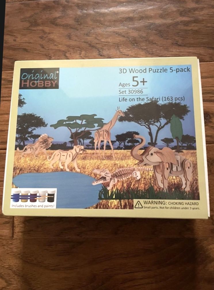 Brand new and sealed: 3-D Wood Puzzle Five Pack, Life On The Safari 163 pieces. Has never been opened it or used it so this can be a great gift for so