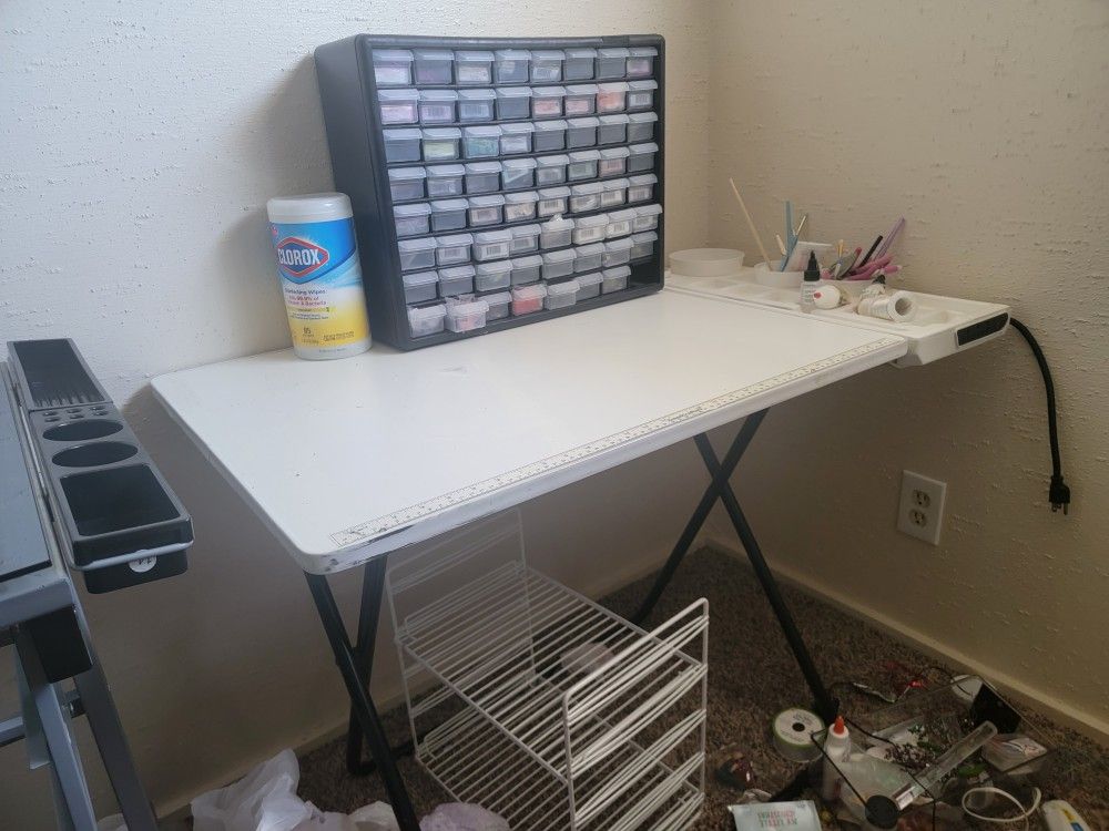 Americrafters folding white sewing craft table with power outlets