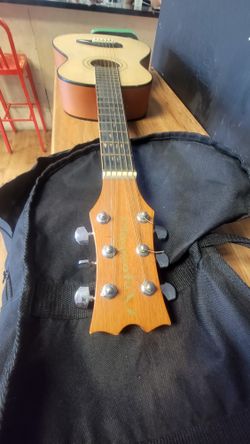 Small Playmate Acoustic Guitar 