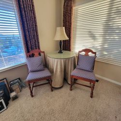 Two vintage wooden side chairs