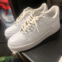 This item is a pair of white Nike Air Force 1 '07 sneakers.