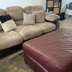 Couch With Ottomon And Pillows 
