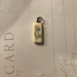 Tiny Pendant With Blue Flower 
