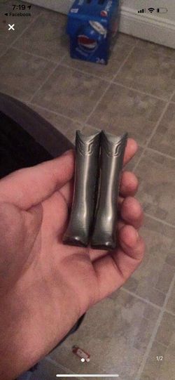 Brand new cowboy boots cake topper silver in color $10