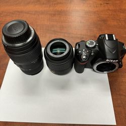 Nikon Camera And Telephone Zoom Lens 