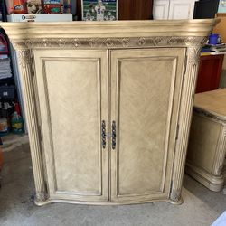 armoire closet with top and bottom section