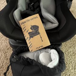 Never Used Nuna Pipa Lite Series Car Seat & Base 
