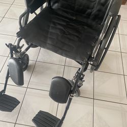 Wheelchair with elevated footrest 