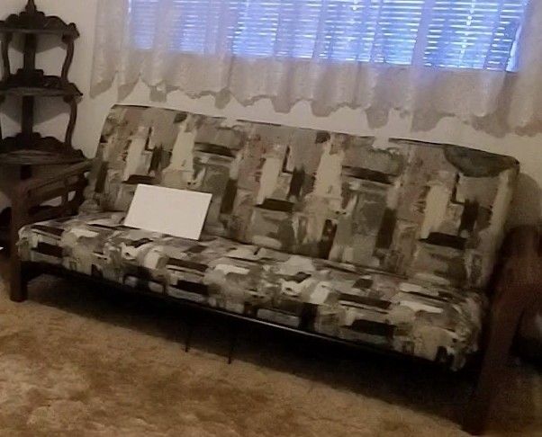 Comfy and Convenient Futon - Perfect for Small Spaces