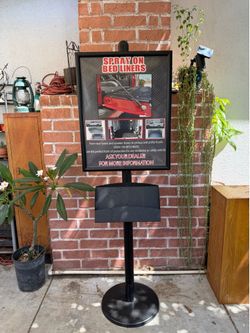 Metal sign holder