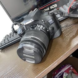 Canon EOS s550D with 18-55 lens included