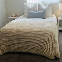 Bed frame with mattress and night tables