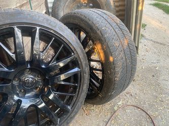 256/40/20 R Nissan rims all four with Tires