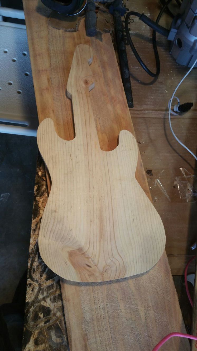 Wood guitar cutout