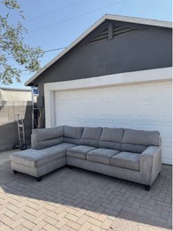 GREY SECTIONAL COUCH ***FREE DELIVERY ***