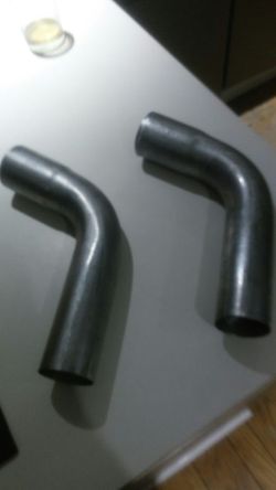 Flowmaster Exhaust Tips. Brand New. Never used. Meant to dual exit behind rear tires
