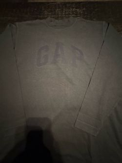 Small Yeezy Gap black long sleeve shirt with white bird graphic and red beak,  #gap #kanye
