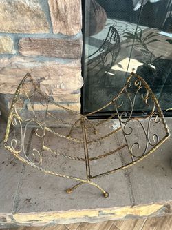 Fireplace log holder