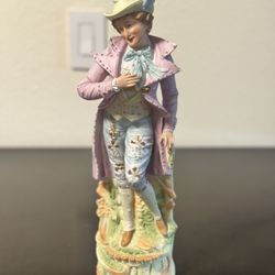 vintage porcelain figurine of a gentleman in Victorian or Rococo style attire