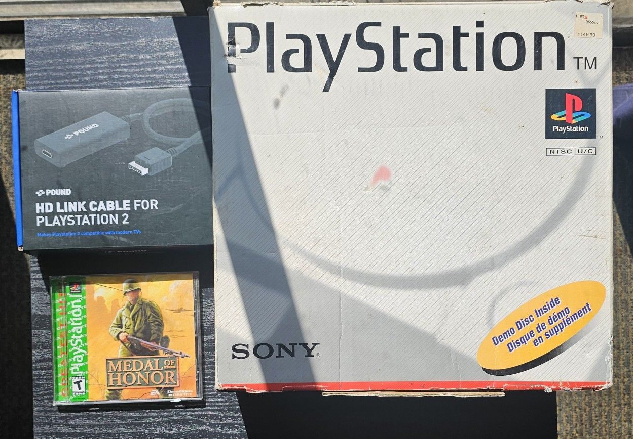 Playstation 1 PS1 With Box and Manual. Plus HDMI adapter Tested and works OBO
