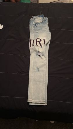 Amiri Distressed Light Wash Jeans