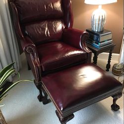 Hancock & Moore leather armchair and ottoman