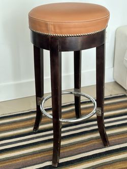 Chelini Bar Stools with leather top by Michele Bonan