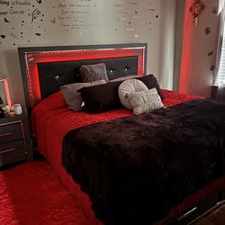 King size bed with LED lights, remote, nightstand and dresser with mirror.