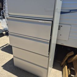 4 Drawers Tall File Cabinet In Good Condition, Doesn't Have Keys 