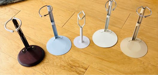 5 Doll stands, metal and wood.