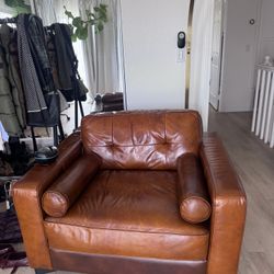 Brown leather chair. Great for Den or office