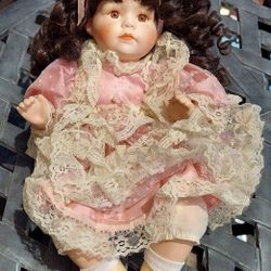 Seated Porcelain Handcrafted Doll 