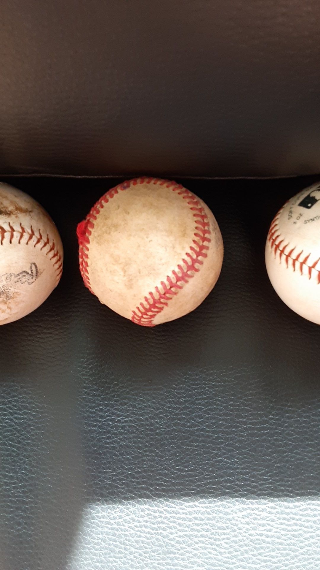 4 baseball balls