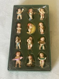 Vintage boxed set of 12 miniature resin angel Christmas hanging ornaments.