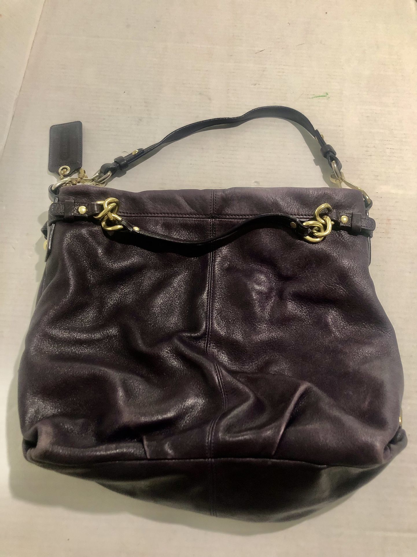 Stunning Coach Leather Plum Hobo Handbag  Absolutely Stunning  Inside is in excellent Condition, Gently used corners but if you clean it with leather 