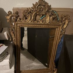 Antique Rococo style omate gold cilded wall mirror