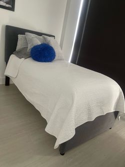 Twin bed with mattress