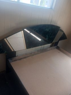 Green glass and mirrored head board and bed frame