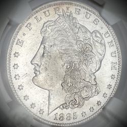 1885 O NGC/MS65 New York Bank Hoard Morgan Silver Dollar