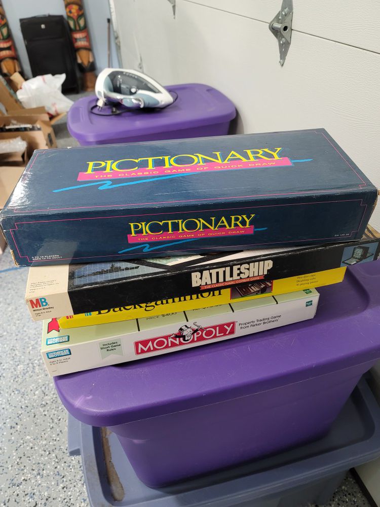 Board games pictionary, battleship, monopoly, or backgammon family night entertainment