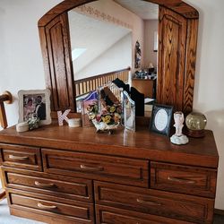 Oak lowboy dresser with mirror 
66.25"w x 18.25"d x 32"h