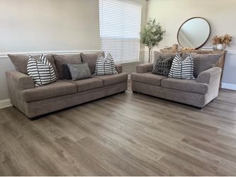 Gray sofa and loveseat set