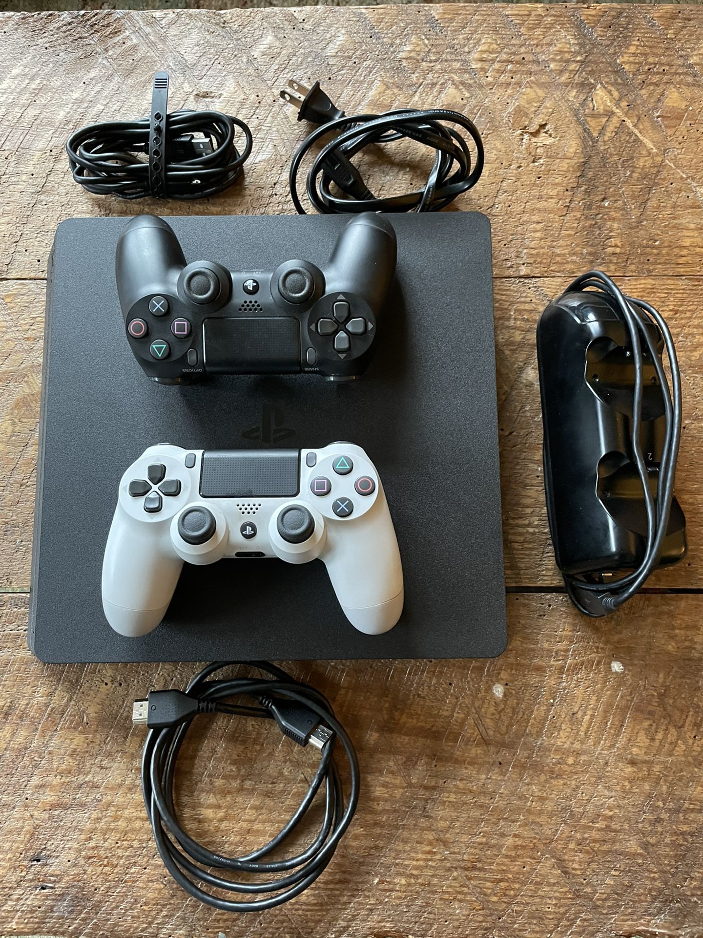 SALE] Sony PS4 Pro 1TB + 2x controllers and charger + 4 games