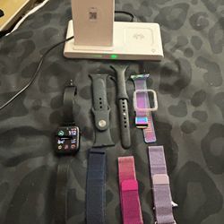 Apple Watch SE (2nd Gen) Black, w/ 7 bands, & triple charging station